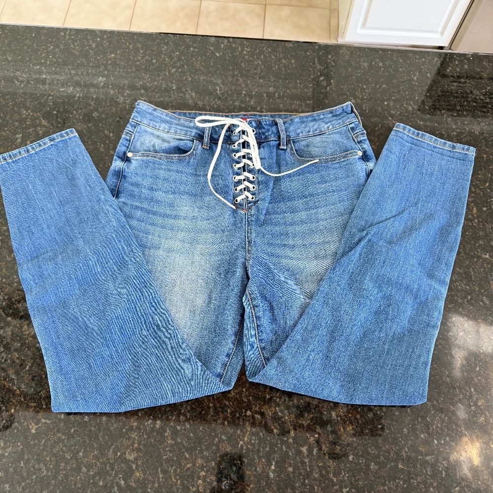 2 Pairs of lace up jeans.  Guess and American Eagle.